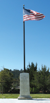 Photo of Flag on Cemetery Grounds